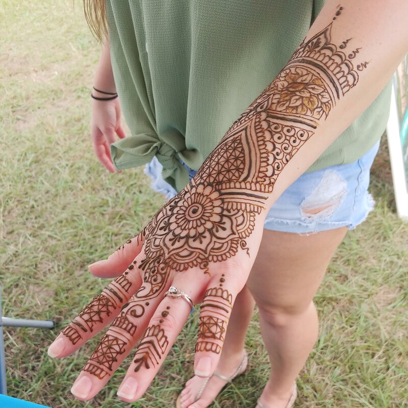 henna hand tattoo at tampa outdoor festival 
