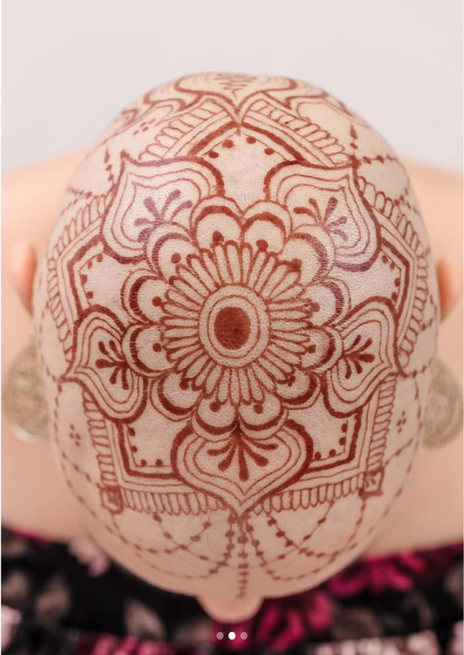 henna on head for cancer patient in chemotherapy 